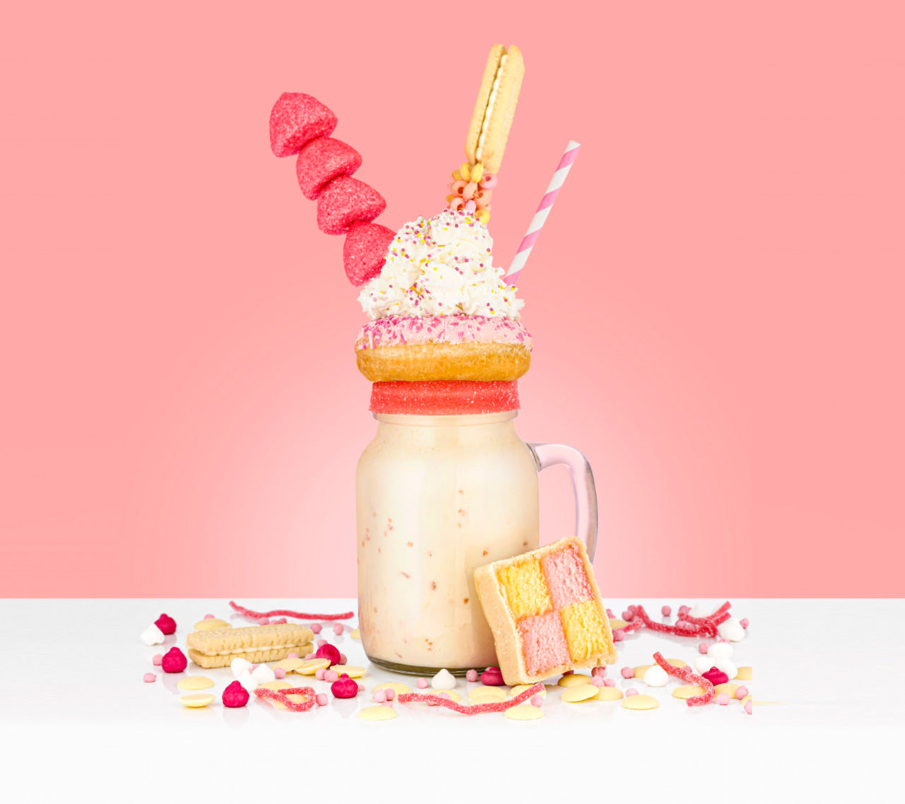 shmoo freakshake with cream, doughnut, biscuits and sweets