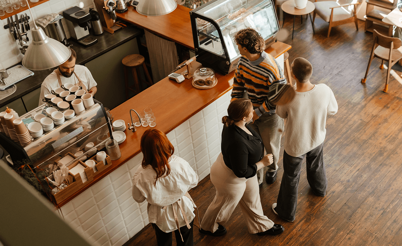 people at a stall of a local cafe
