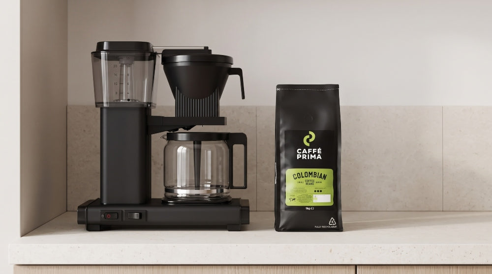 100% Colombian coffee beans next to the filter coffee machine