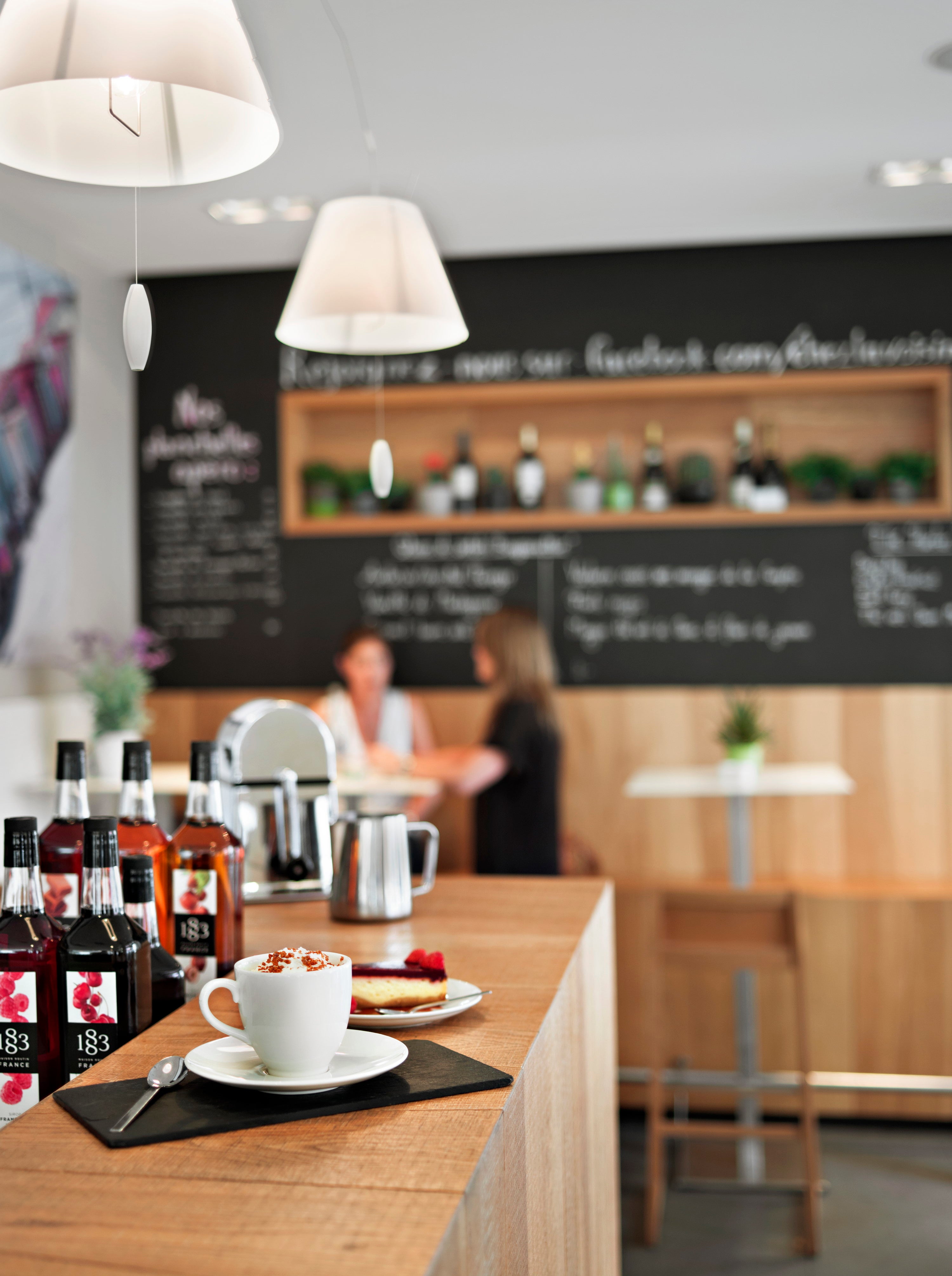 1883 Banana syrup bottle with a bright, clean background.