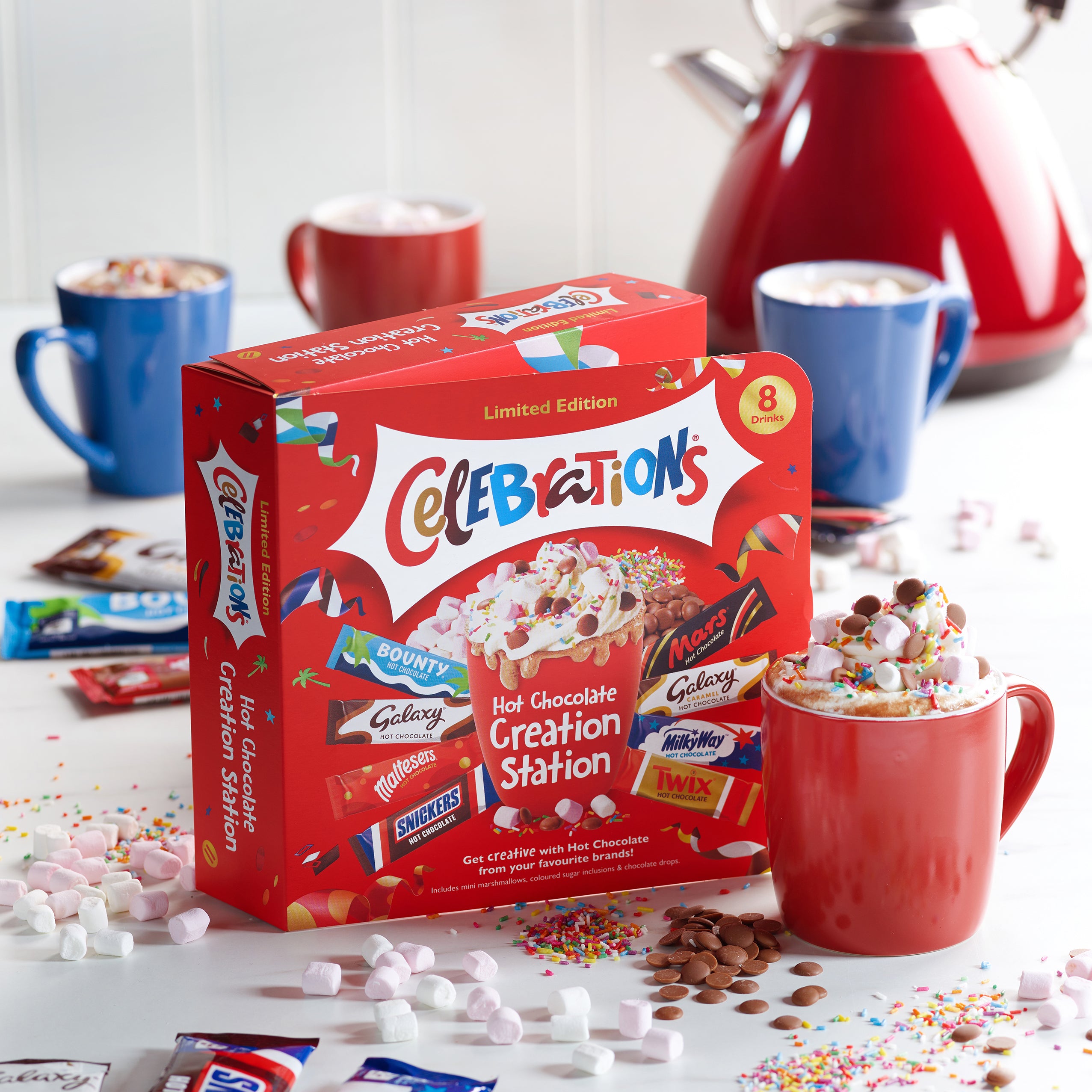A family enjoying a hot chocolate station with Celebrations chocolates
