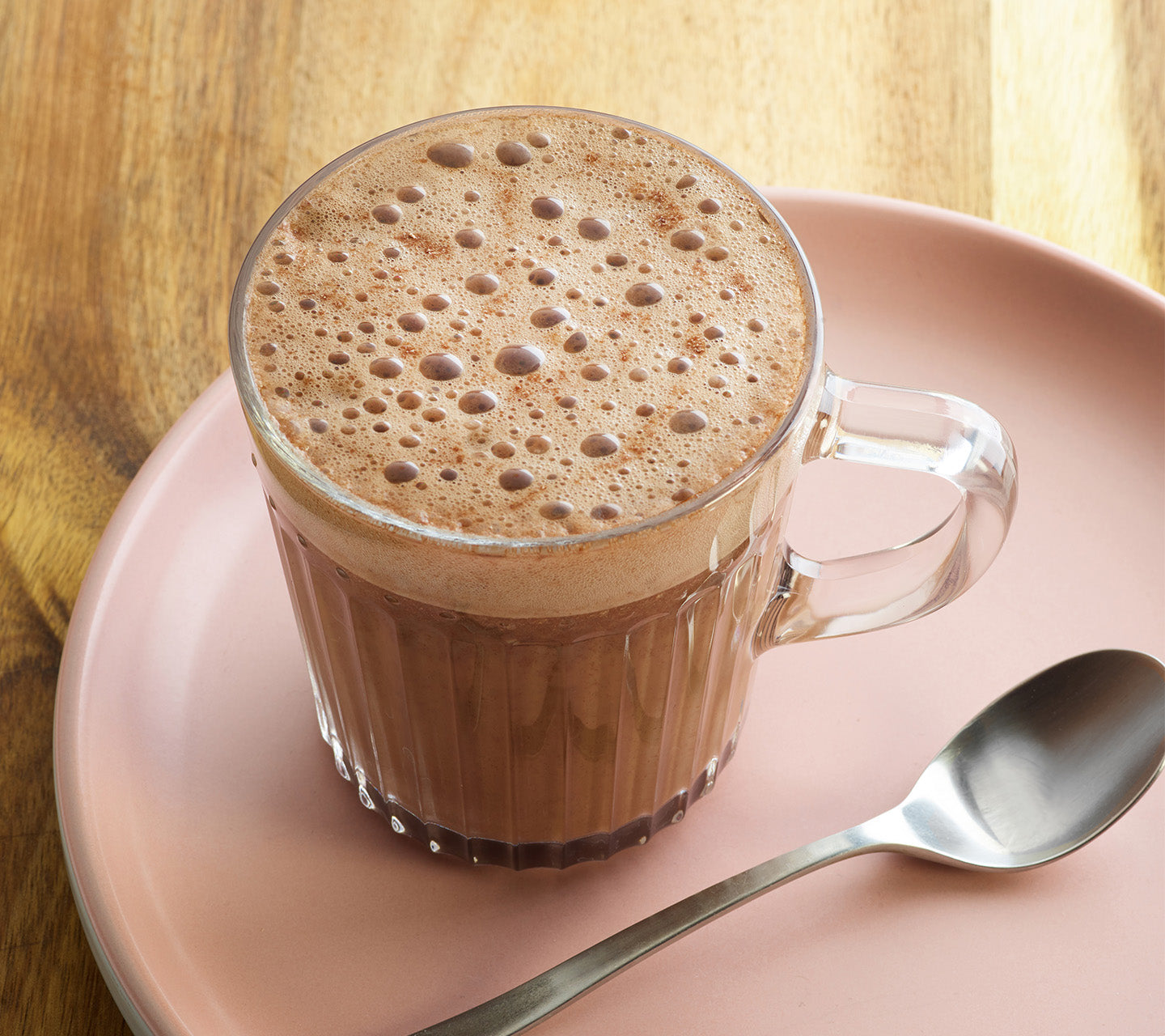 A cup of delicious Galaxy hot chocolate with thick froth
