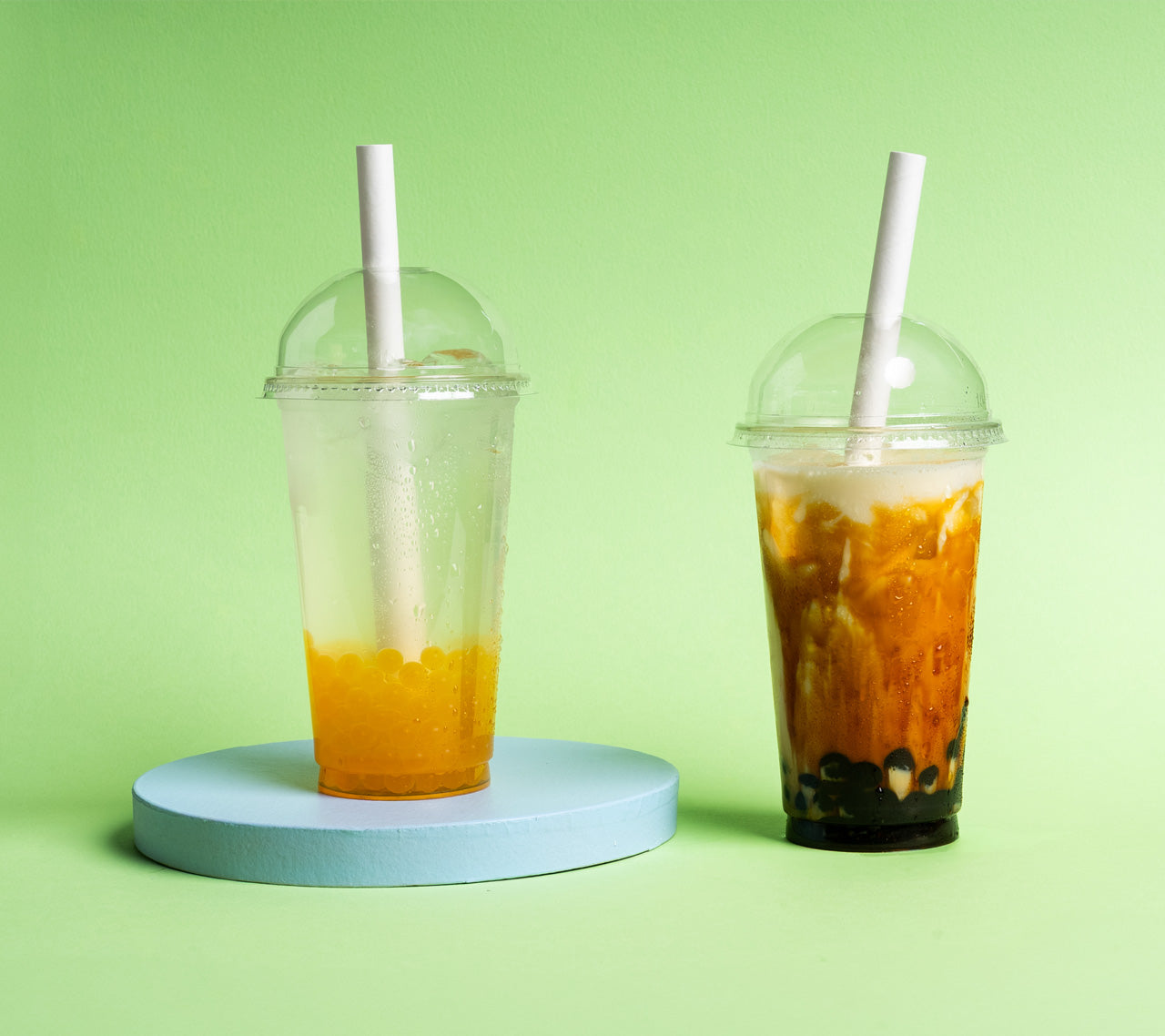 2 plastic cups of bubble tea for takeaway
