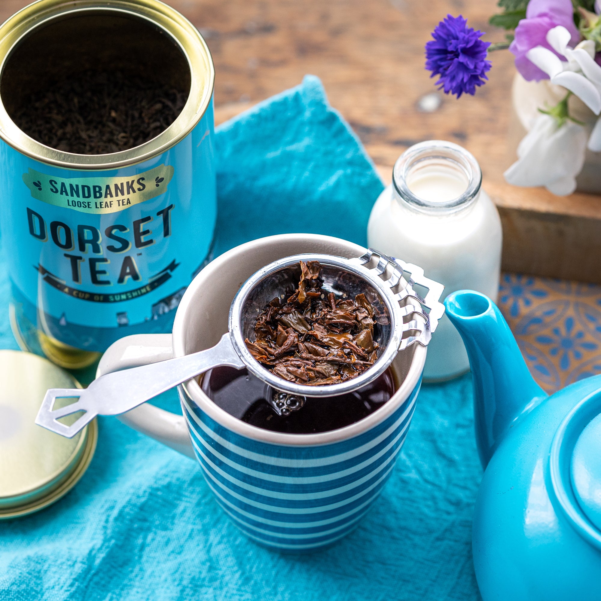 Tea strainer for loose leaf tea with a silver finish.